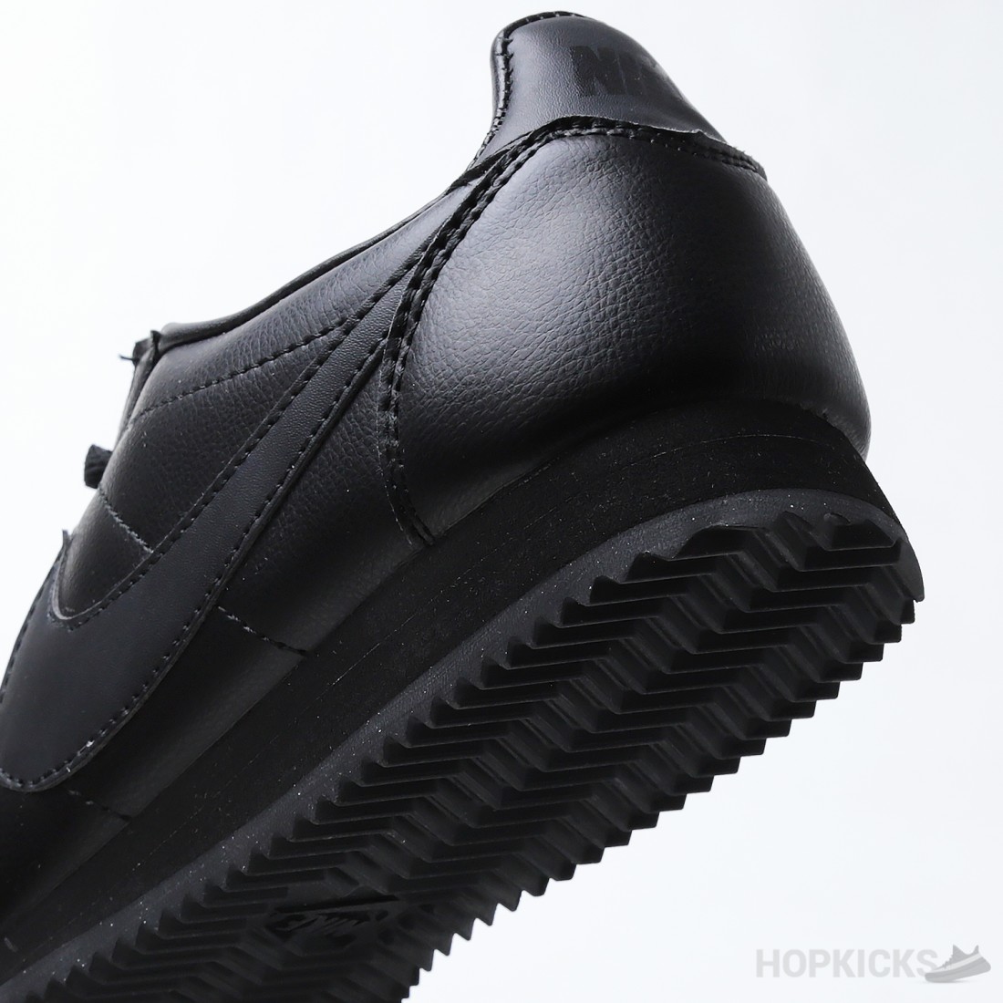 nike cortez triple black nylon